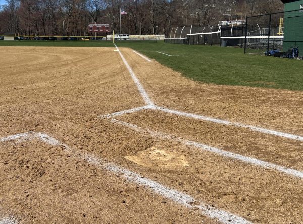 Home plate is covered in dirt after nine innings of varsity softball play and two frames of overtime play against Pocono Mountain East. 