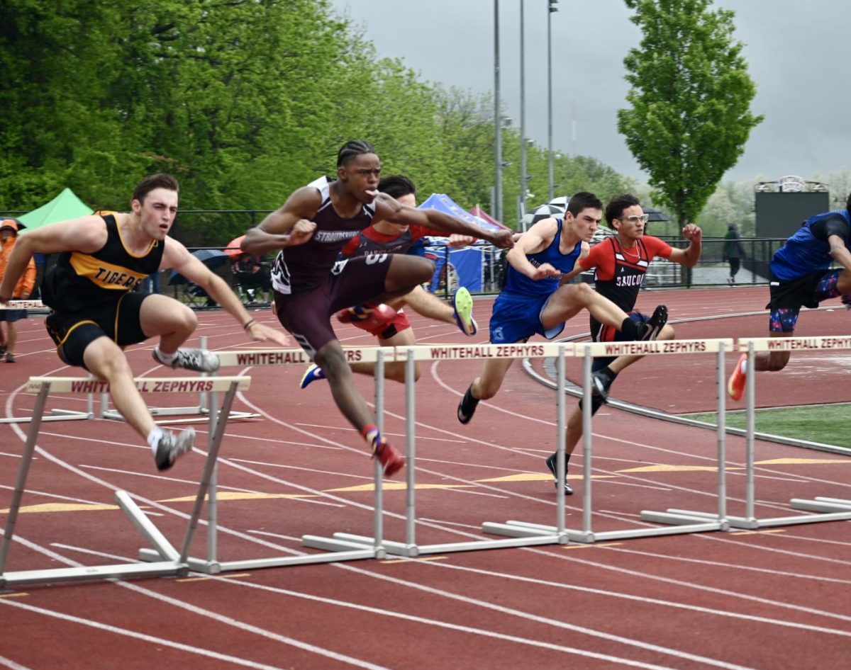 Abiel Quartey, '25, competing in the 110mH at the 2025 Whitehall hosted district competition.  Photo by Edward Anders, '25, shared with permission.