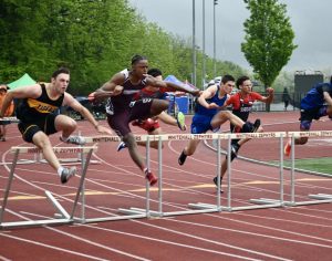 Abiel Quartey, '25, competing in the 110mH at the 2025 Whitehall hosted district competition.  Photo by Edward Anders, '25, shared with permission.