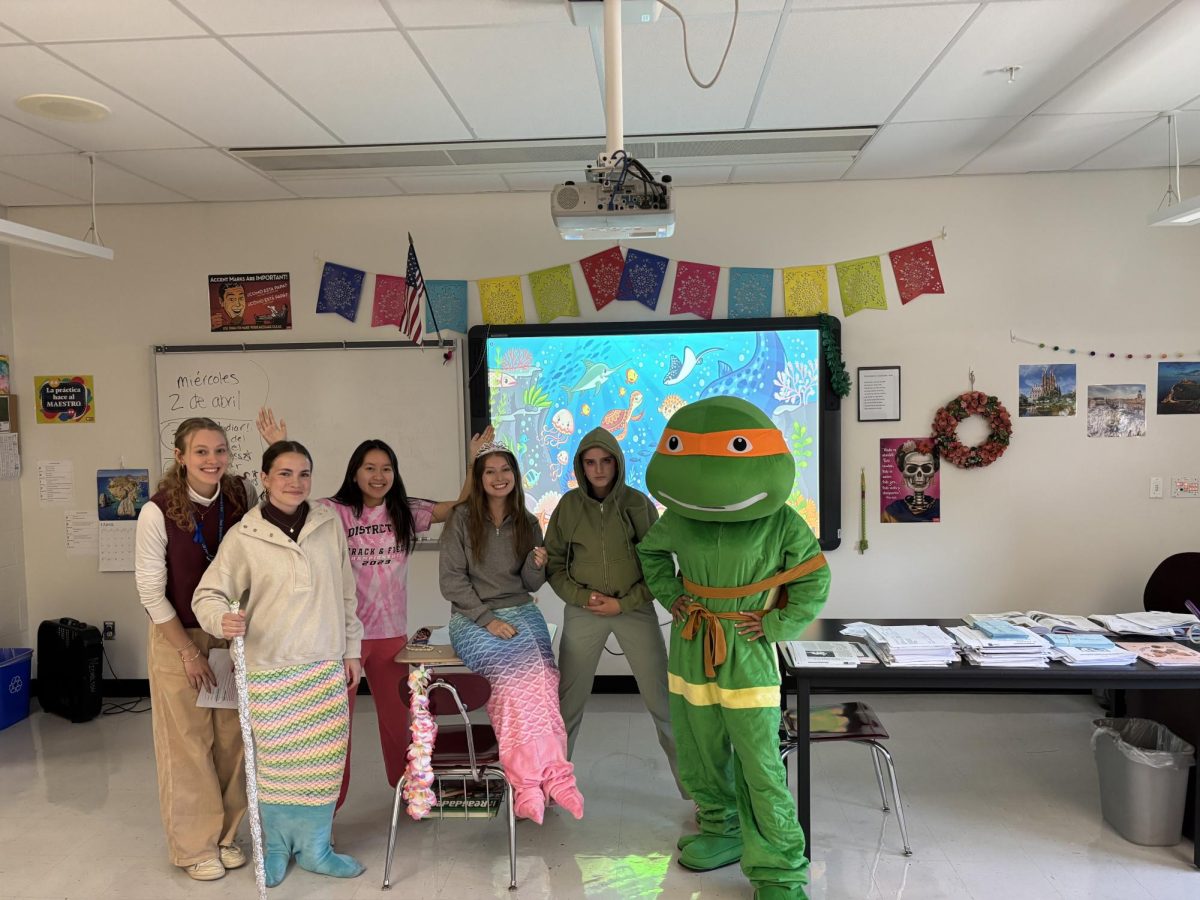 Elizebeth Eberz, '25, Jessica Klein, '25, Julianna Vo, '25, Carolyn Roberti, '25, Cate Brinker, '25, and Michelangelo posing for a group picture.

Photos provided by Amada Nicholson 