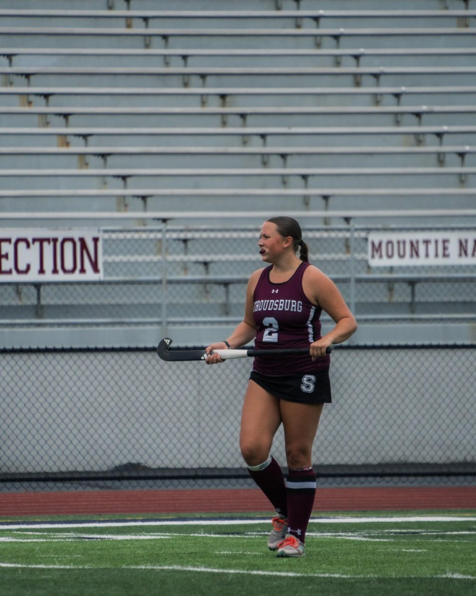 Georgie English, '26, a key player for the Stroudsburg team, looking at her opponents in a very determined way.