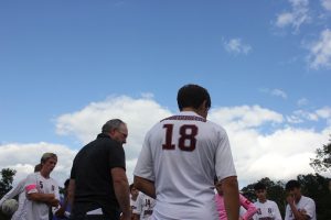 The team huddles to raise team spirits and discuss strategy.
Photo provided by Matias Dunia, '26