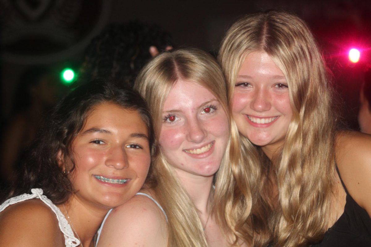 Keala Maronpot ,'28, gets together with Sophie Piggott, '28, and Olivia Selena, '28, for a trio picture.