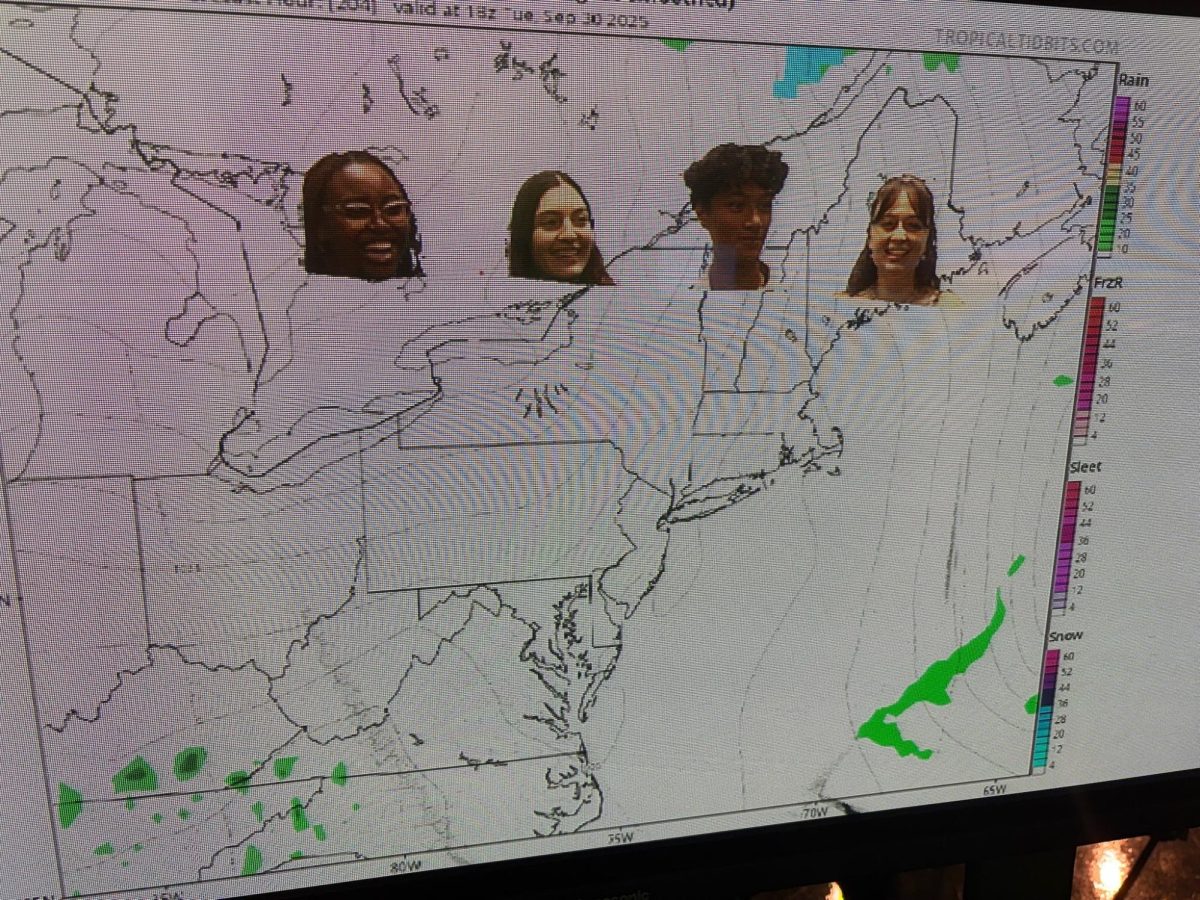 Hailey Abba, '27, Lile Bekaia, '27, Tristan Timones, '27, and Keira Paradis, '28, playing in front of the green screen with a green sheet of paper disguising their bodies.