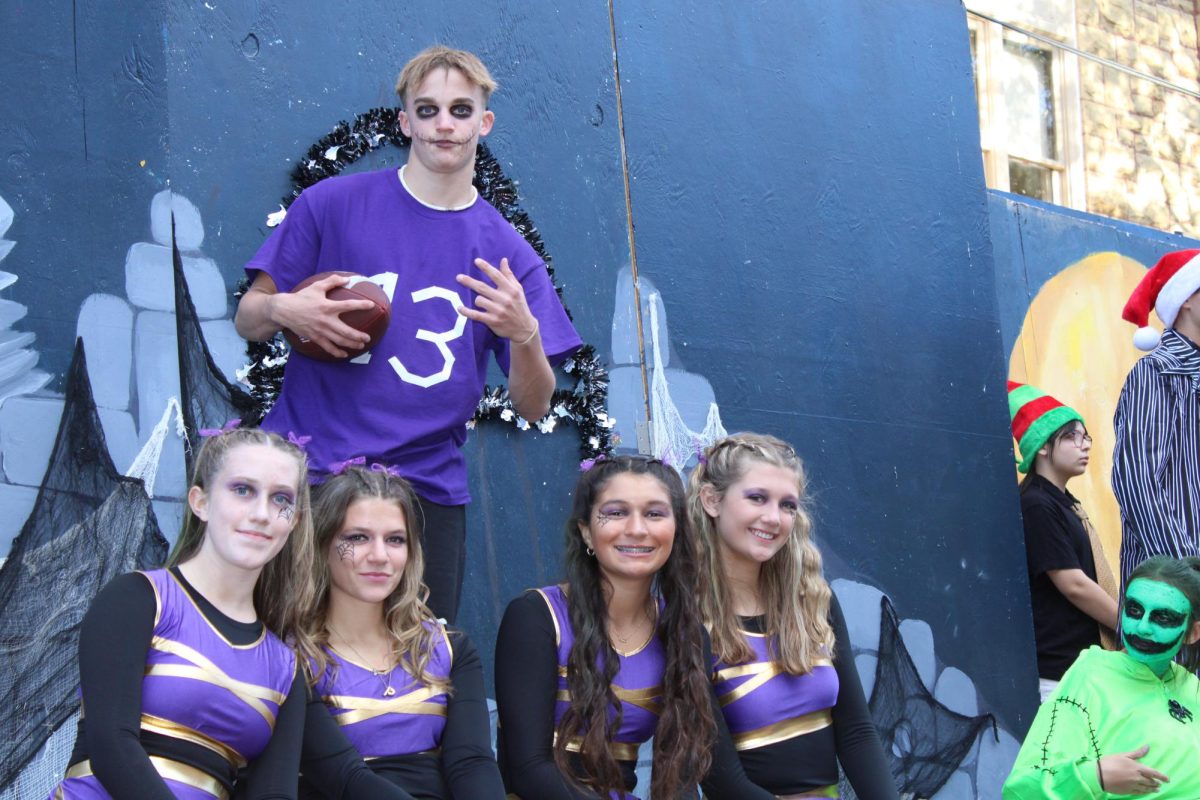 Members of the sophomore float gathered in court house square before the parade.