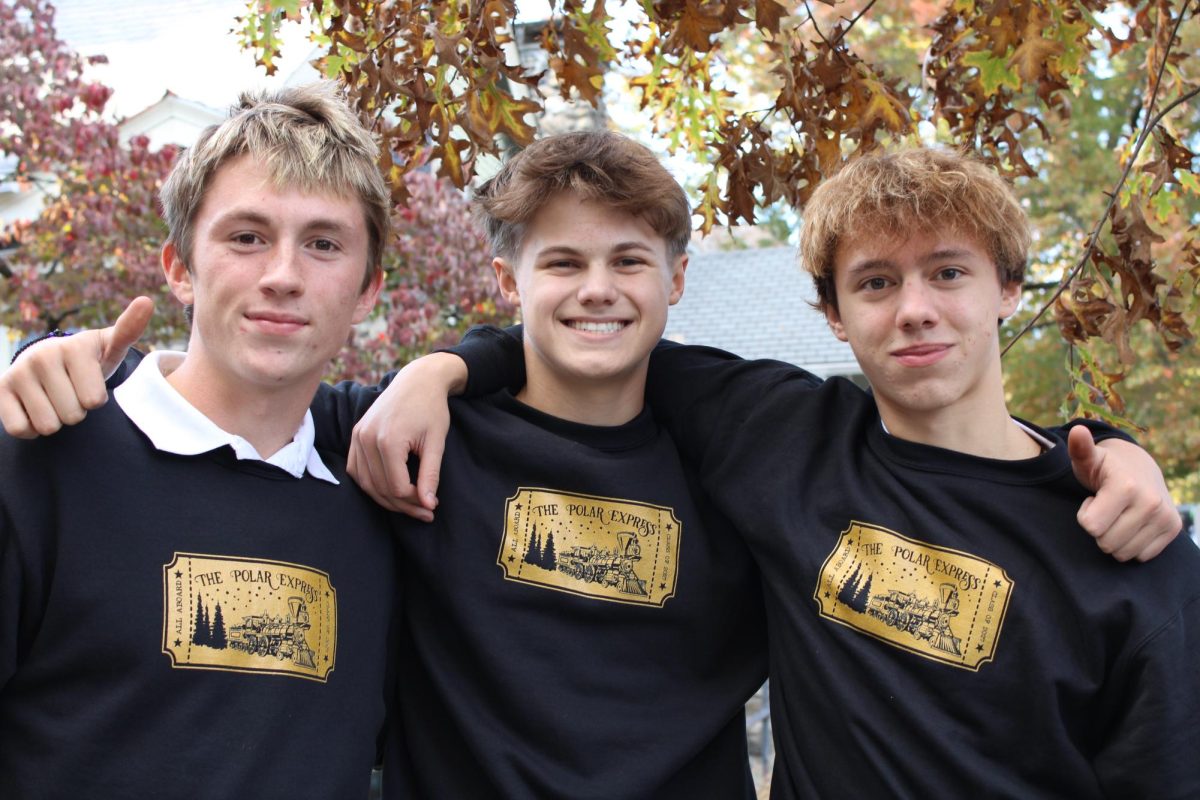 Andrew Paxson, '27, Chris Trethaway, '27, and Jacob Warner, '27, participated in their junior float for "The Polar express."