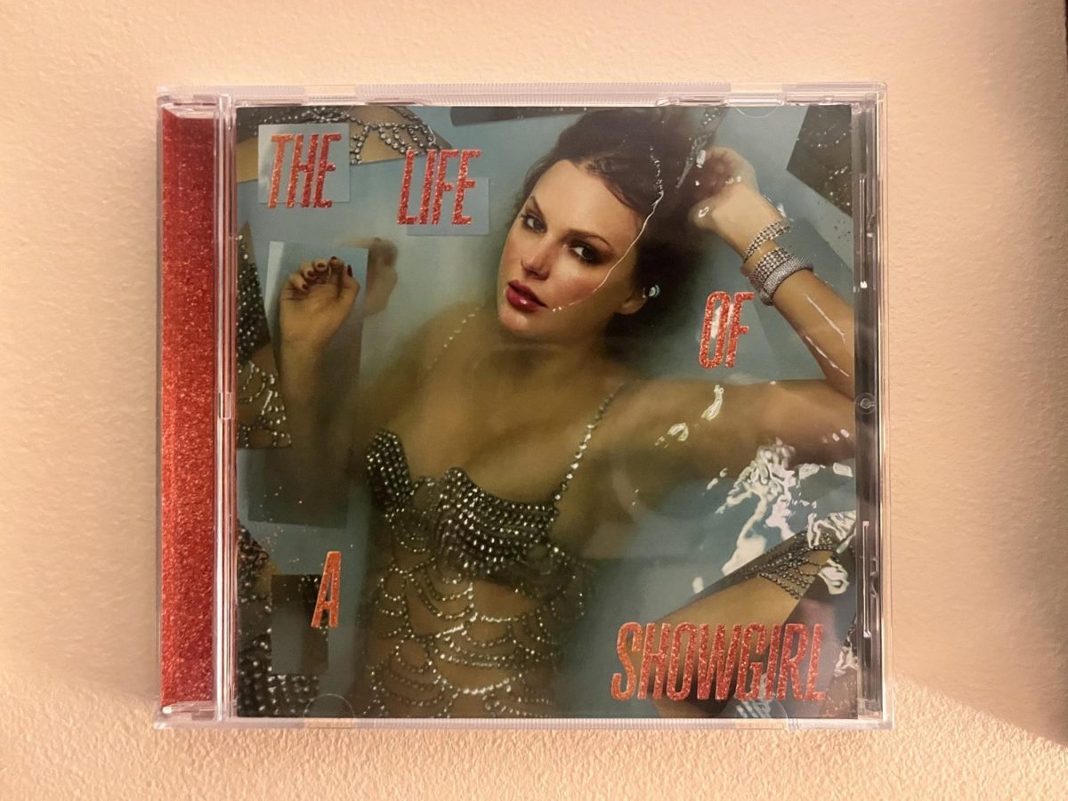 "The Life of a Showgirl" album cover with Taylor representing the famous painting of  Ophelia. 