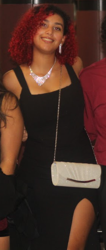 Savana Aroyo posing in a homecoming picture.