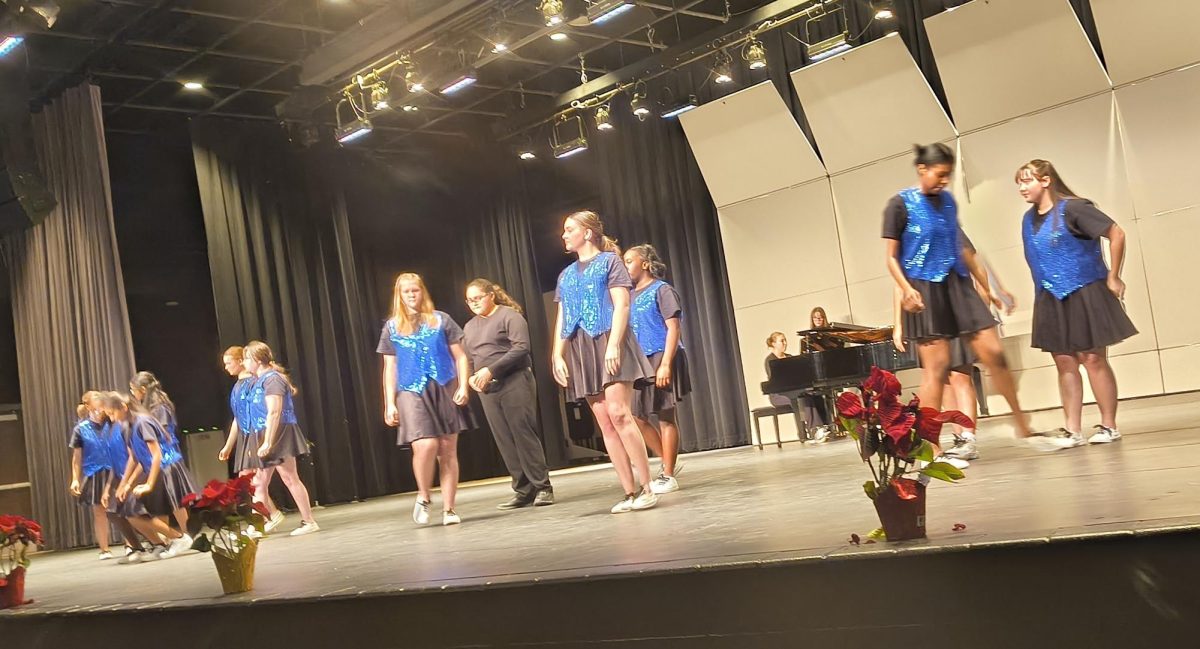 Junior High Show Choir perform their finishing number.