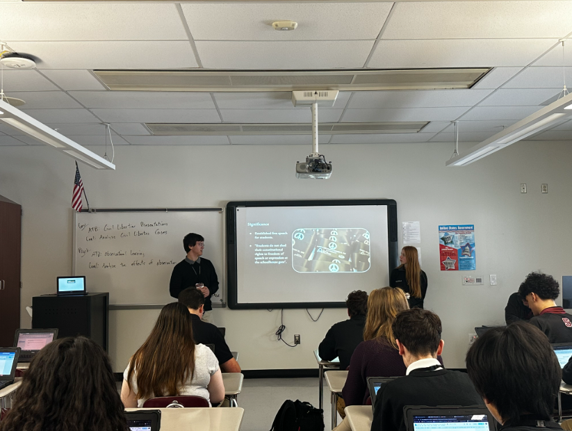 Arda Gocuklu, '26, and Julia Saurman, '27, presenting their Supreme Court case in AP Government.