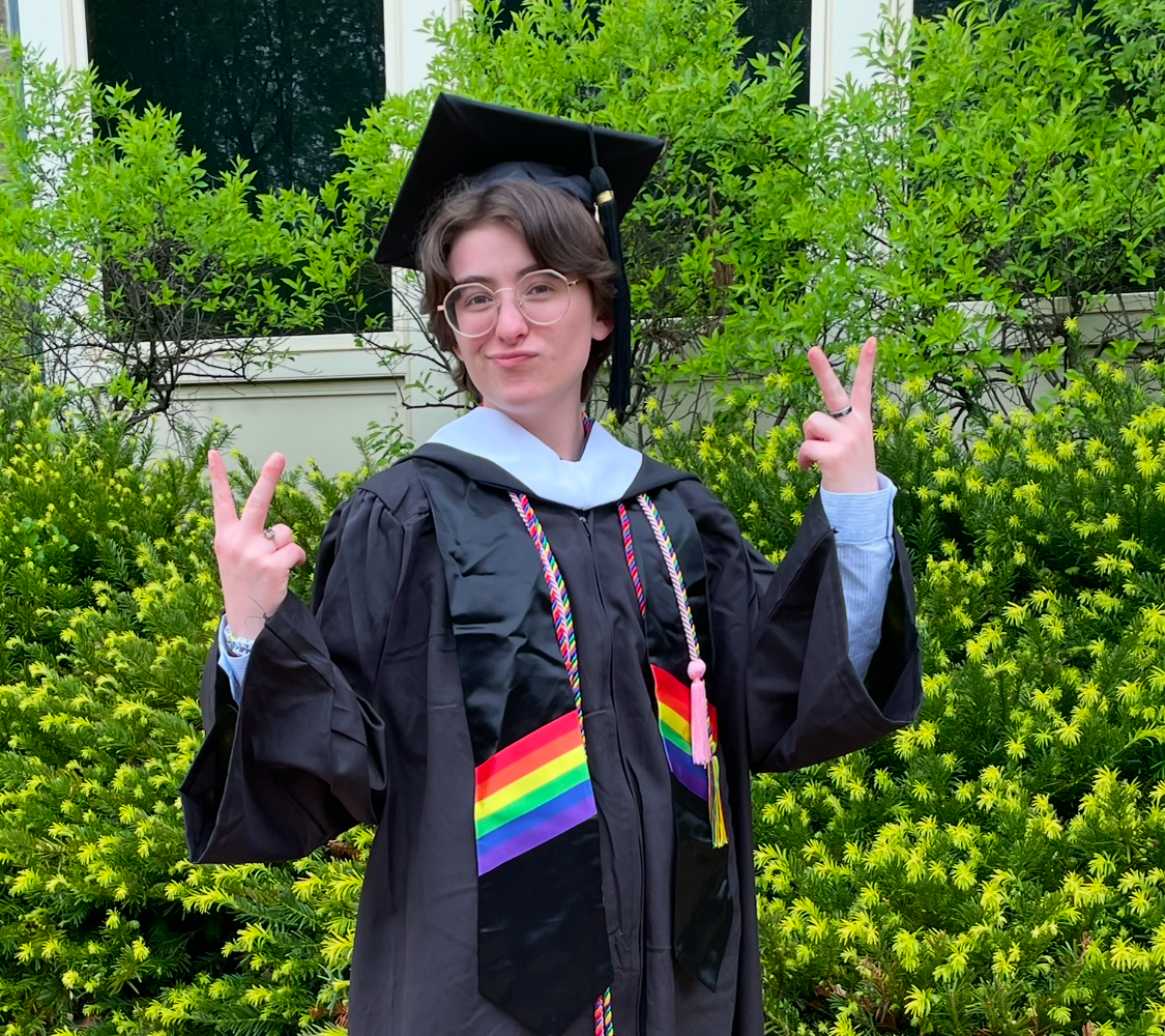Ms. Ortega poses in her graduation gown.