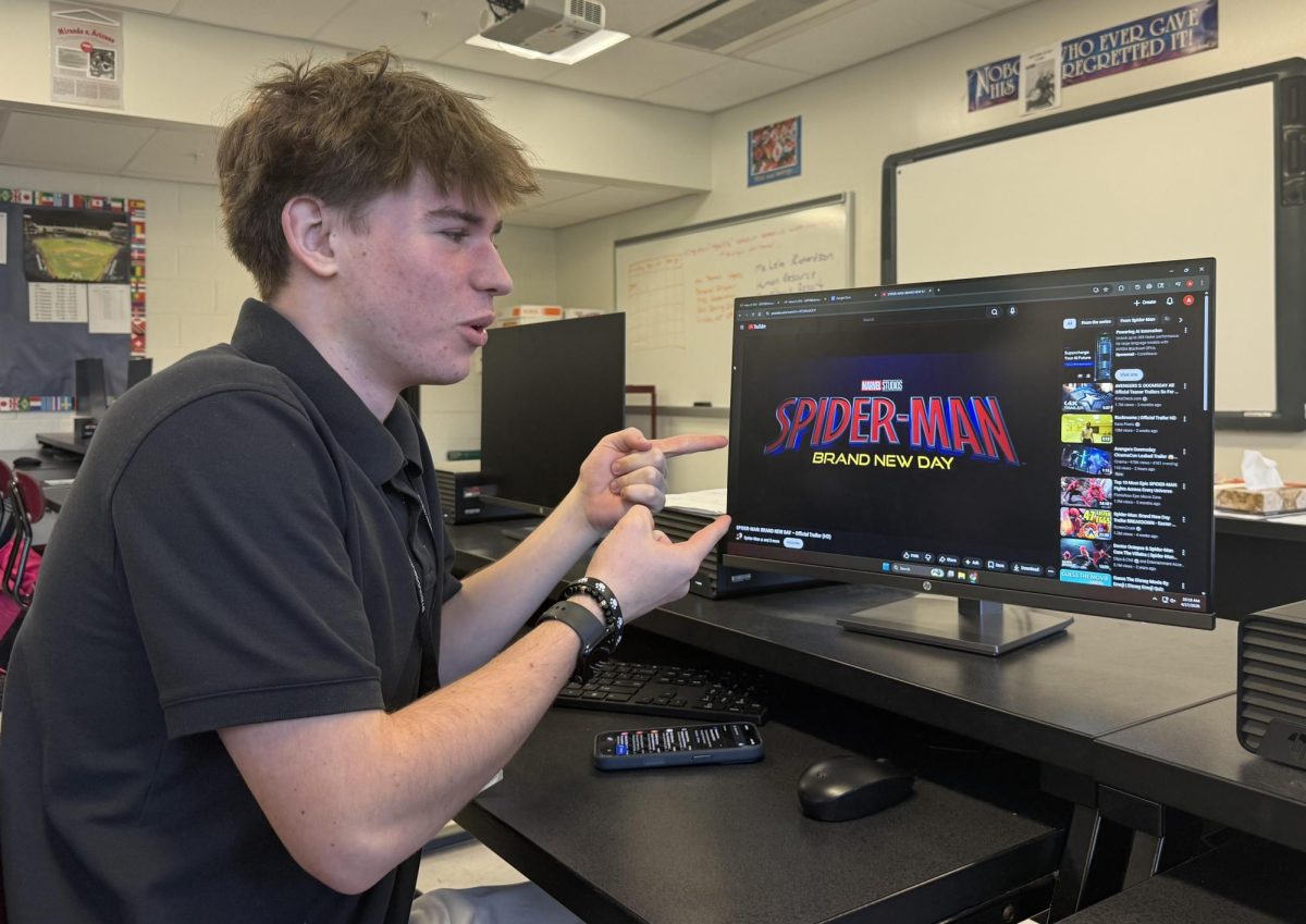 A picture of a student watching the movie's recent trailer